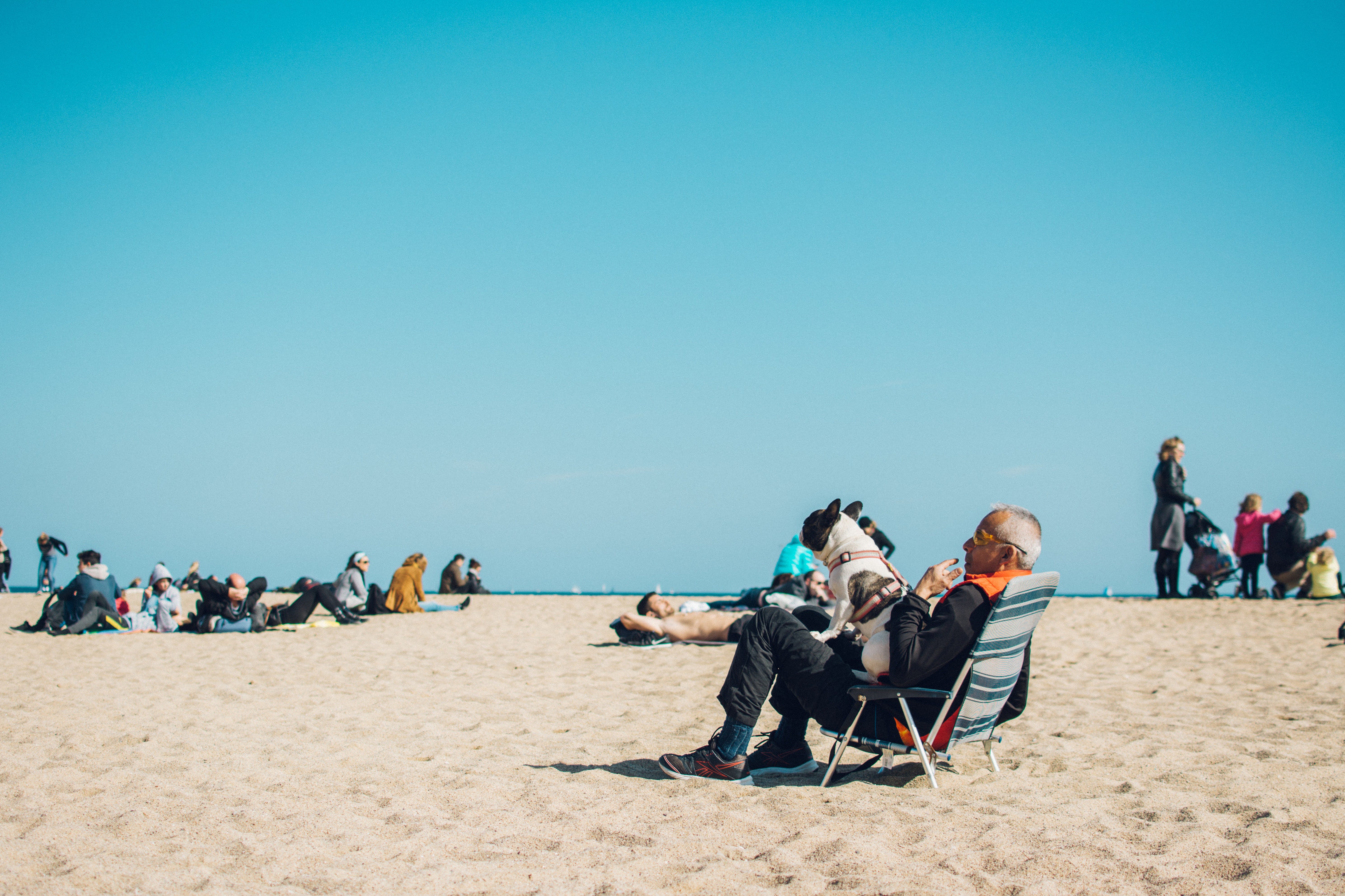 old man relaxing at the beach