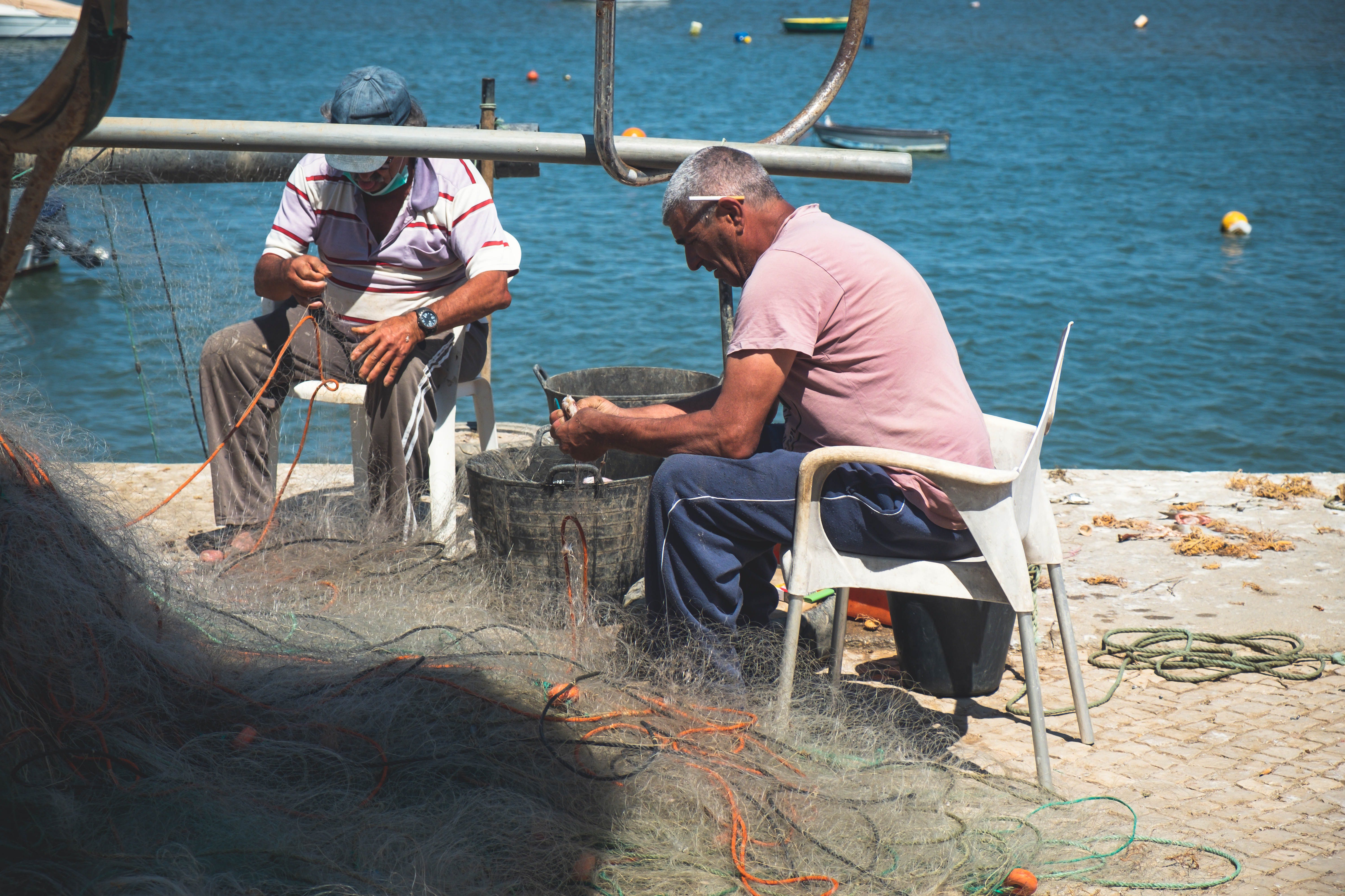 people at work by the beach