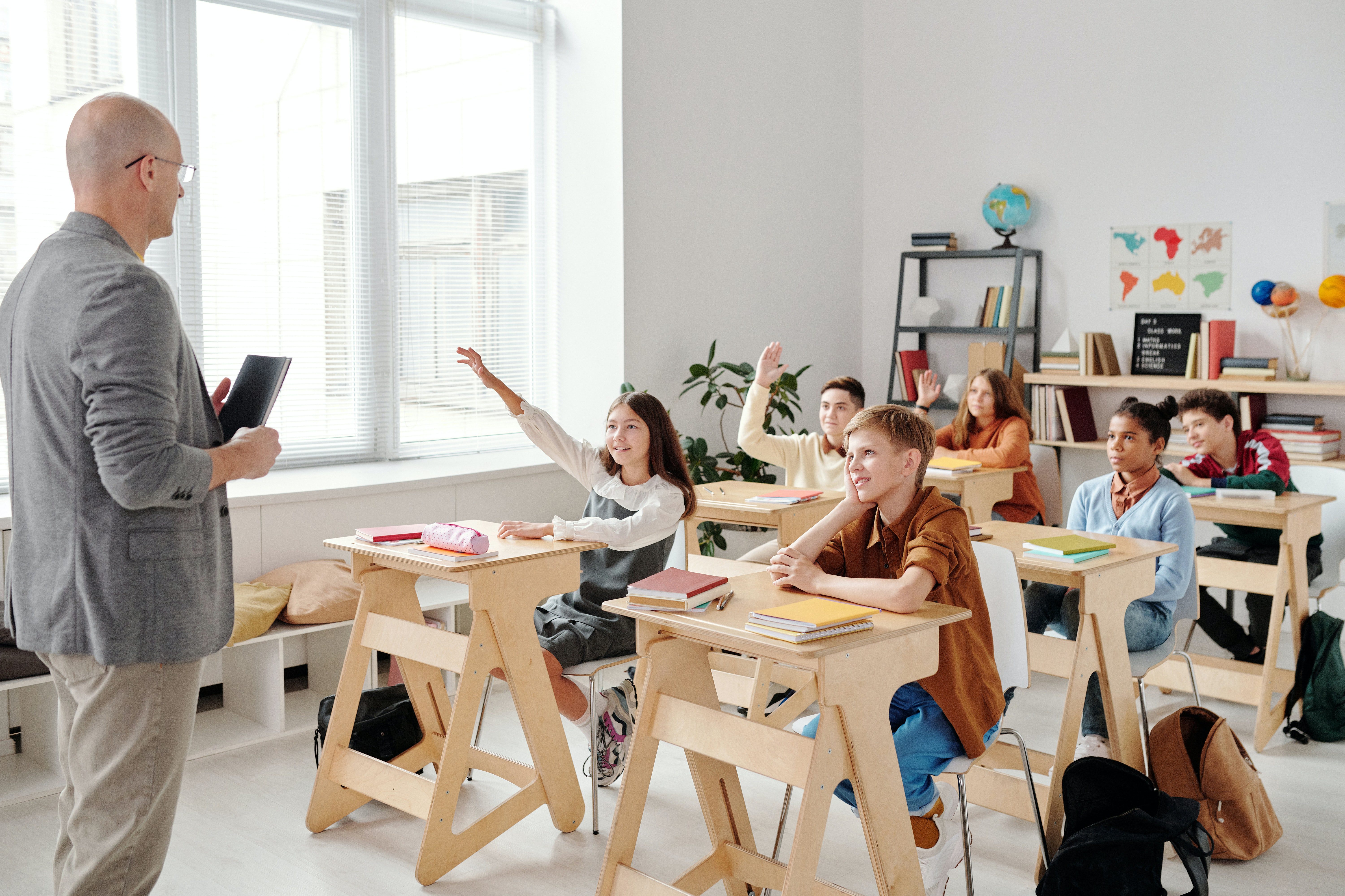 a man teaching in a children's class